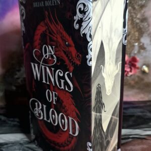 on-wings-of-blood-buecherbuechse-farbschnitt-drache